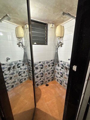 Bathroom in 1 RK Apartment at Nagari Niwara CHS, Goregaon East – for Rent