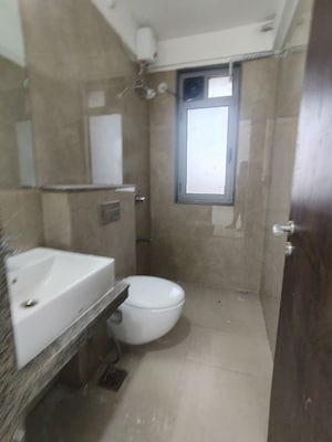 Bathroom in 3 BHK Apartment at Sunteck City Avenue 4, Goregaon West – for Rent