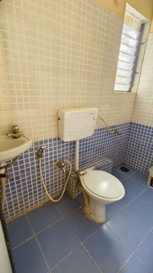 Bathroom in 2 BHK Apartment at Group Seven Rushi Heights, Goregaon East – for Rent