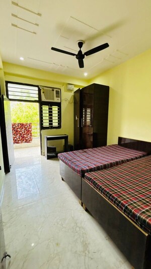 Bedroom in 2 BHK Builder Floor at Ansal Plaza Sector-23, Sector 23 – for Rent