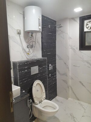 Bathroom in 3.5 BHK Builder Floor at Malibu Shopping Arcade, Sector 47 – for Rent