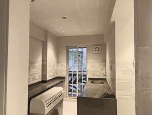 Building Lobby in 2 BHK Apartment at New Konkan CHS, Andheri East – for Rent