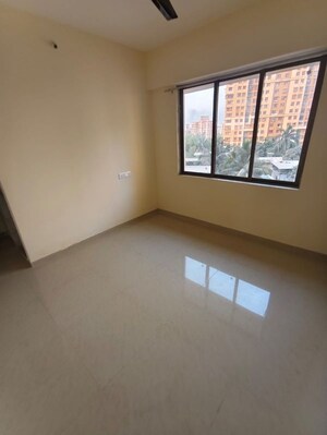 Master Bedroom in 1 BHK Apartment at Pushpanjali Heights, Owale – for Rent