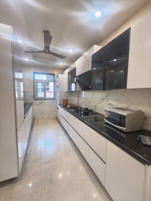 Kitchen in 4 BHK Builder Floor at Ansal Plaza Sector-23, Sector 23 – for Rent