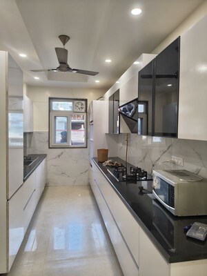 Kitchen in 4 BHK Builder Floor at Ansal Plaza Sector-23, Sector 23 – for Rent