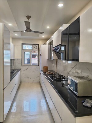 Kitchen in 4 BHK Builder Floor at Ansal Plaza Sector-23, Sector 23 – for Rent