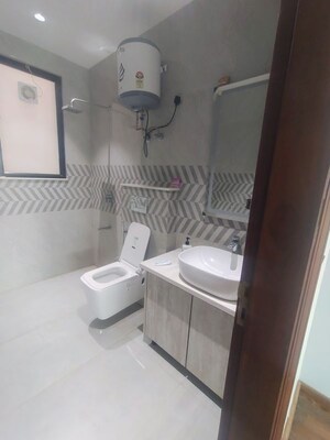 Bathroom in 4 BHK Builder Floor at Ansal API Versalia, Sector 67a – for Rent