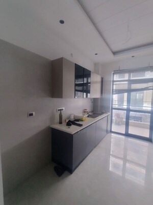 Kitchen in 4 BHK Builder Floor at Ansal API Versalia, Sector 67a – for Rent