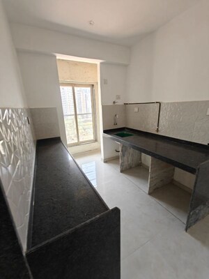 Kitchen in 2 BHK Apartment at Abrol Signature, Malad West – for Rent