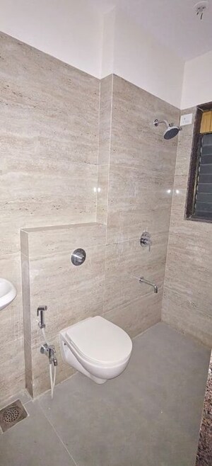 Bathroom in 2 BHK Apartment at Abrol Signature, Malad West – for Rent