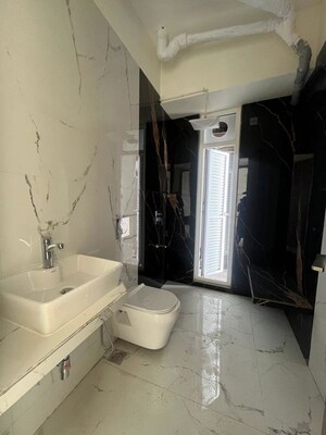 Bathroom in 3 BHK Apartment at Ruparel Palacio Phase 1, Kandivali West – for Rent
