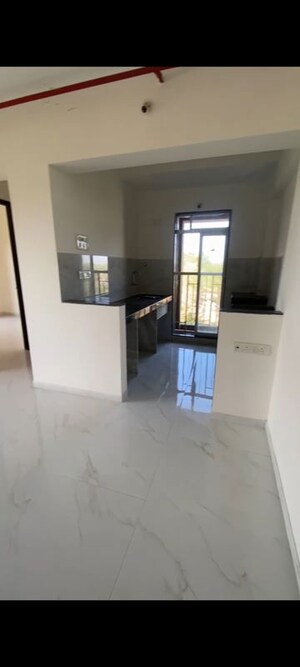 Kitchen in 1 BHK Apartment at Metropolis Bayside, Kasarvadavali – for Rent