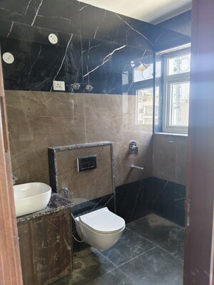 Bathroom in 1 RK Apartment at Ansal Api Versalia 2, Sector 67a – for Rent