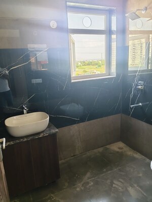 Bathroom in 1 RK Apartment at Ansal Api Versalia 2, Sector 67a – for Rent