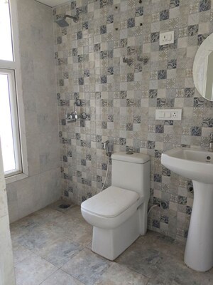 Attached Bathroom in 2 BHK Apartment at Nilaya Greens, Raj Nagar Extension – for Sale