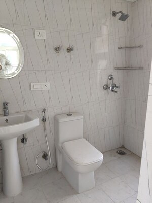 Bathroom in 2 BHK Apartment at Nilaya Greens, Raj Nagar Extension – for Sale
