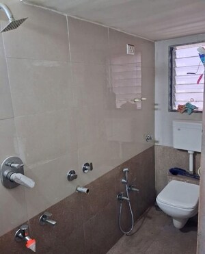 Bathroom in 2 BHK Apartment at Dombivli East – for Sale
