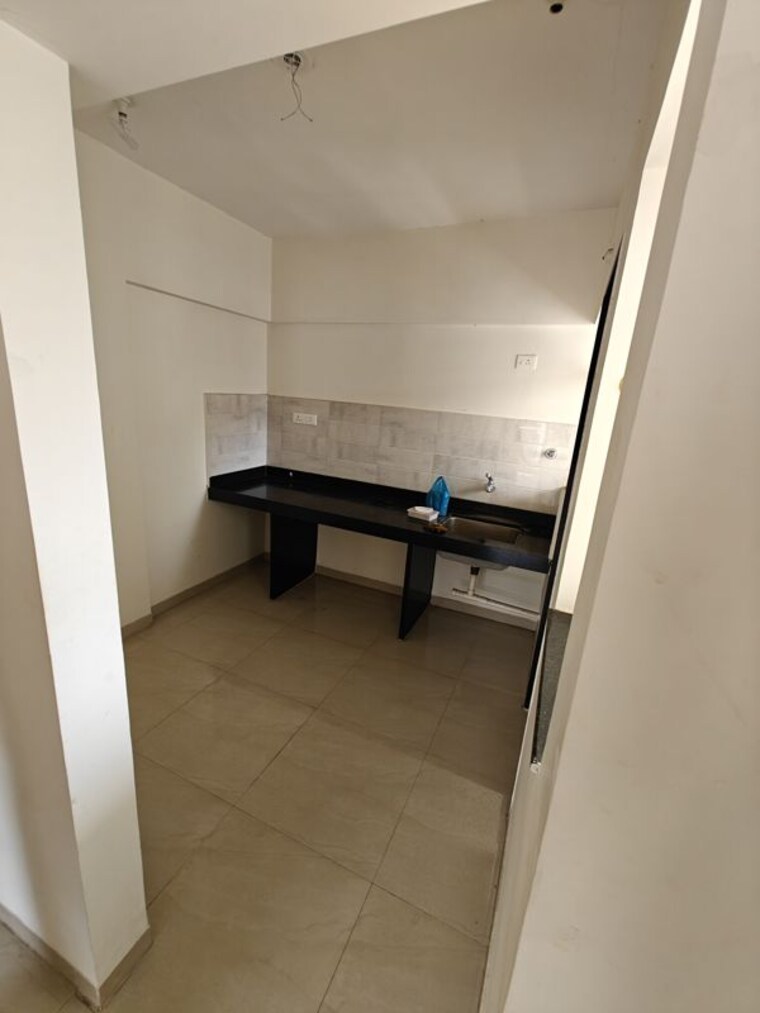 Kitchen, arv-newtown 2 Bedroom 736 Sq.Ft. Apartment In Pisoli Pune 10267981