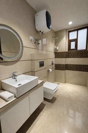 Bathroom in 4 BHK Builder Floor at Shakti Khand 2 – for Sale
