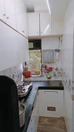 Kitchen in 2 BHK Apartment at Parvati Kunj, Matunga West – for Sale