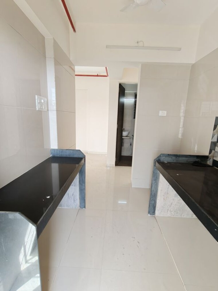Kitchen, strawberry-the-address 2 Bedroom 1060 Sq.Ft. Apartment In Mira Road East Thane 10268036
