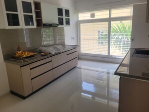Kitchen in 4 BHK Apartment at Model Colony – for Rent