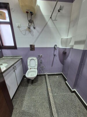 Bathroom in 3 BHK Apartment at Greater Kailash – for Rent
