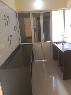 Kitchen in 2 BHK Apartment at JSB Nakshatra Greens, Naigaon East – for Rent