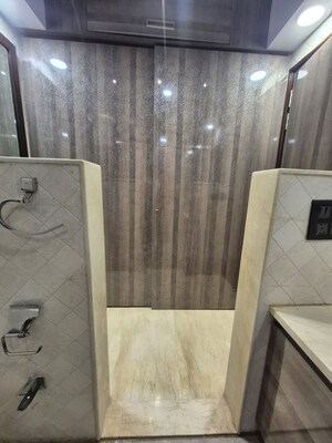 Bathroom in 3.5 BHK Apartment at Kailash Colony – for Rent