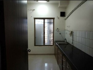 Kitchen in 2.5 BHK Apartment at Oberoi Realty Woods, Goregaon East – for Rent