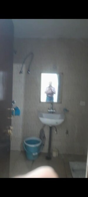 Bathroom in 2 BHK Apartment at Hindon Green Apartments, Hindan Vihar – for Rent