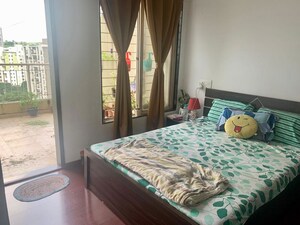 Bedroom in 2 BHK Apartment at Karan Suncoast, Bavdhan – for Rent