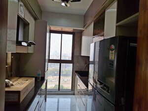 Kitchen in 2 BHK Apartment at Raymond Ten X Habitat, Pokhran Road No Two – for Rent