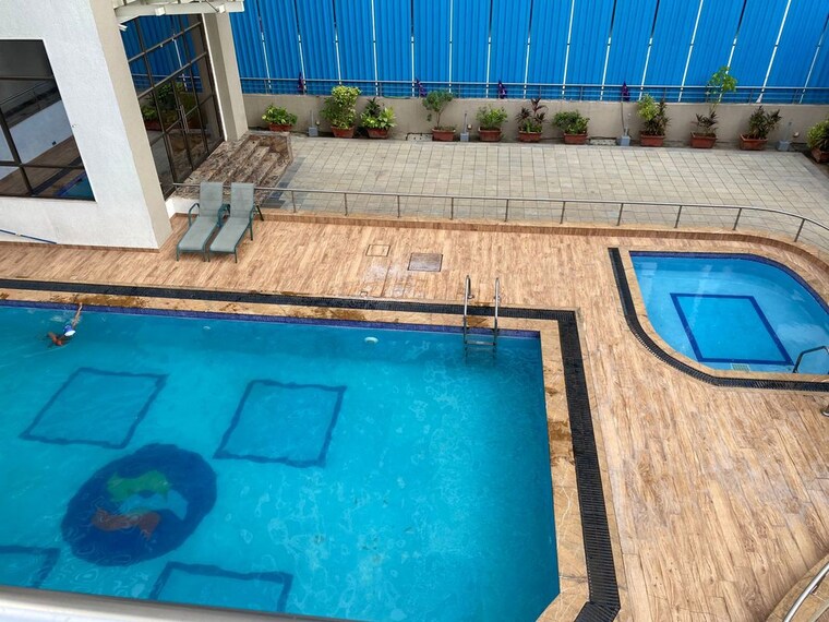 Swimming Pool, kakad-paradise-phase-2 1 Bedroom 458 Sq.Ft. Apartment In Mira Road East Thane 10268552