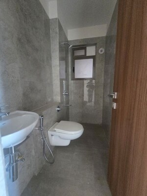 Bathroom in 2 BHK Apartment at Kalpataru Yugdharma, Malad West – for Rent