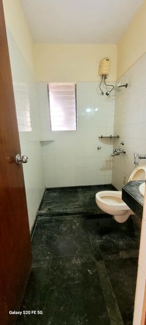Bathroom in 2 BHK Apartment at Evershine Aangan, Goregaon West – for Rent
