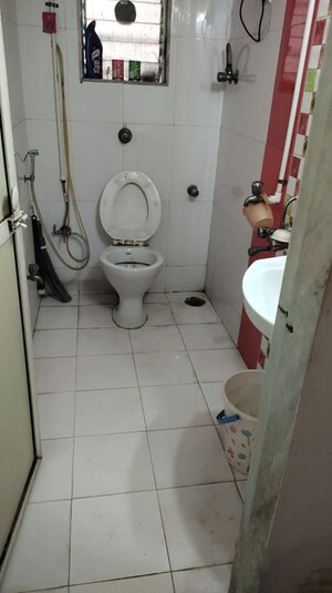 Bathroom in 2 BHK Apartment at Shri Drushti CHS, Kasarvadavali – for Rent