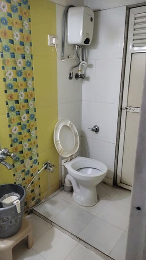 Bathroom in 2 BHK Apartment at Shri Drushti CHS, Kasarvadavali – for Rent