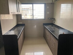 Kitchen in 2 BHK Apartment at Nakul CHS, Malad West – for Rent