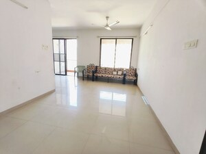 Living Room in 2 BHK Apartment at Kolte Patil Margosa Heights, Mohammadwadi – for Rent