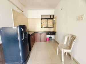 Kitchen in 2 BHK Apartment at Kolte Patil Margosa Heights, Mohammadwadi – for Rent