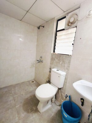Bathroom in 2 BHK Apartment at Kolte Patil Margosa Heights, Mohammadwadi – for Rent