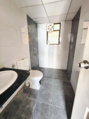 Bathroom in 2 BHK Apartment at Kolte Patil Margosa Heights, Mohammadwadi – for Rent