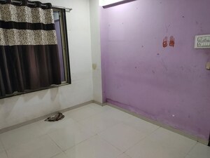 Bedroom in 1 BHK Apartment at Abhishek Ashtavinayak Complex, Kasheli – for Rent