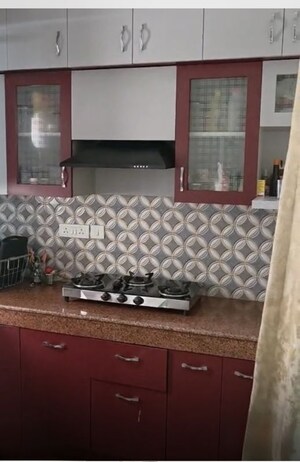 Kitchen in 2 BHK Apartment at Uninav Bliss, Raj Nagar Extension – for Sale