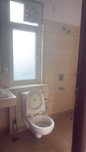 Bathroom in 3.5 BHK Apartment at Puri Diplomatic Greens Phase I, Sector 111 – for Rent