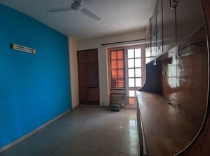 Living Room in 3 BHK Apartment at Eros Woodbury Tower, Charmwood Village – for Rent