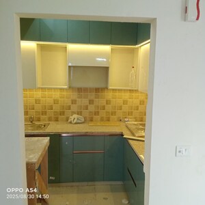 Kitchen in 3 BHK Apartment at Mahagun My Woods, Sector 16c Greater Noida – for Rent