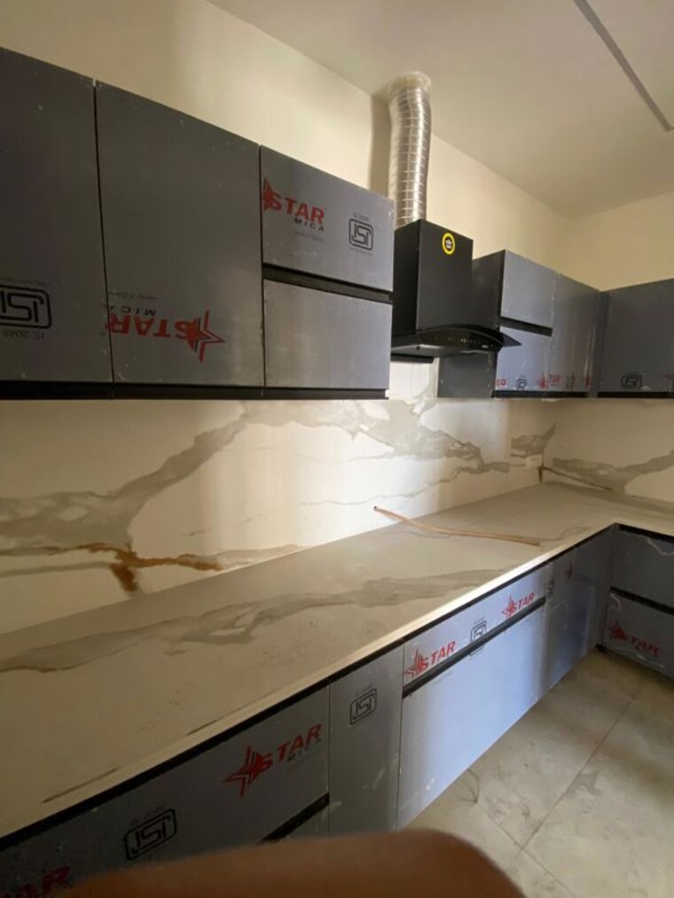 Kitchen, malwa-escon-primera 3 Bedroom 1550 Sq.Ft. Apartment In International Airport Road Zirakpur 10269225