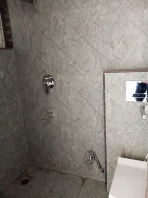 Bathroom in 3 BHK Apartment at Bafna Arisha, Lulla Nagar – for Sale